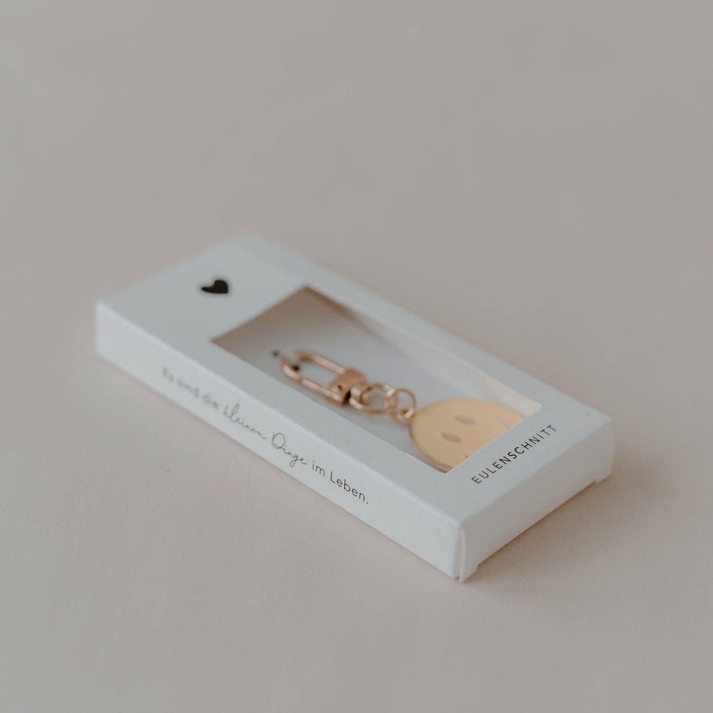 Gele sleutelhanger met smiley (VE = 6 stuks)