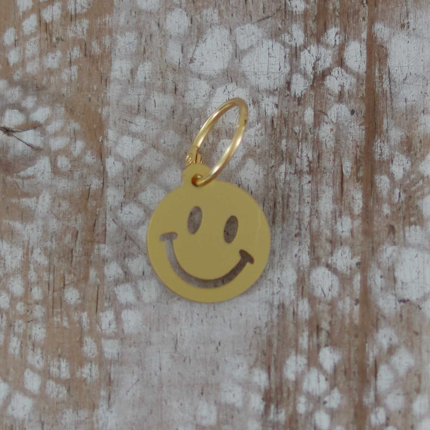 Troostsleutelhanger smiley GOUD