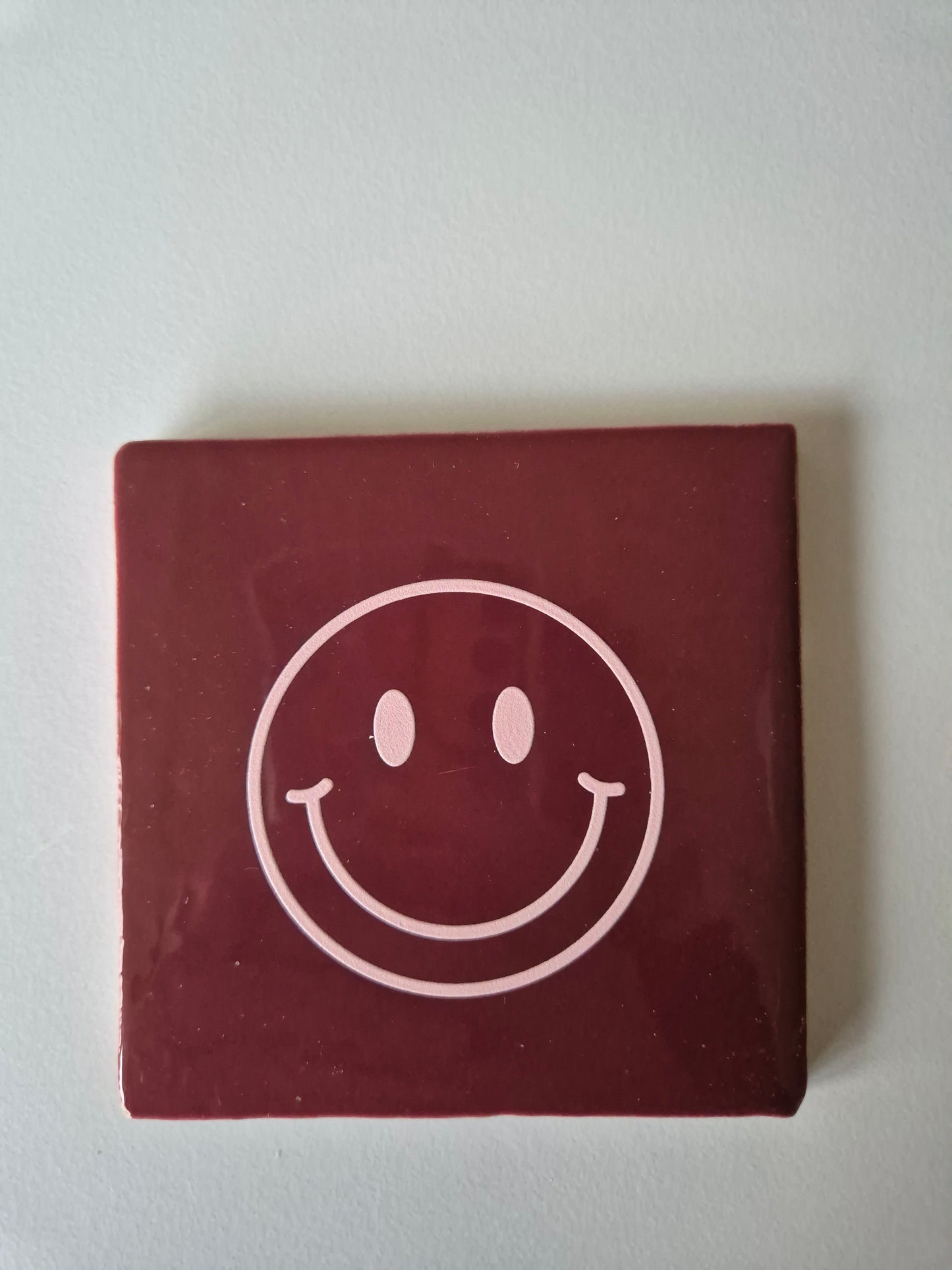 Tegel bordeaux smiley