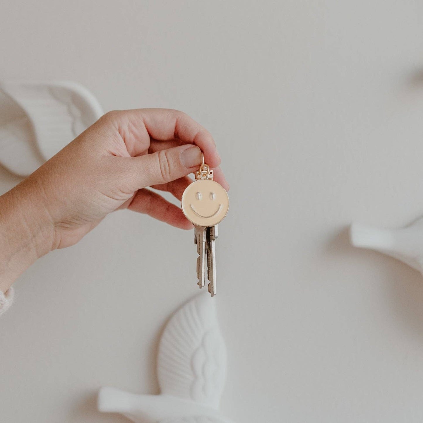 Gele sleutelhanger met smiley (VE = 6 stuks)