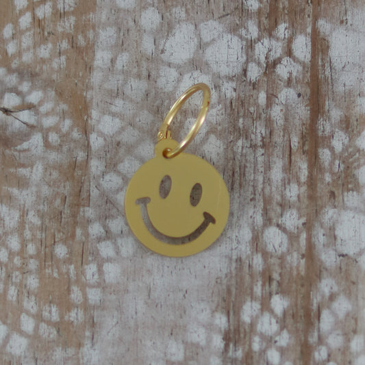 Troostsleutelhanger smiley GOUD
